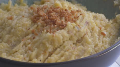 mashed banana plantain puree, on a turning table ready to eat, part 1