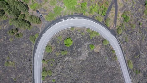 drone-flying-above-the-road-to-Etna-Volcano-in-italy