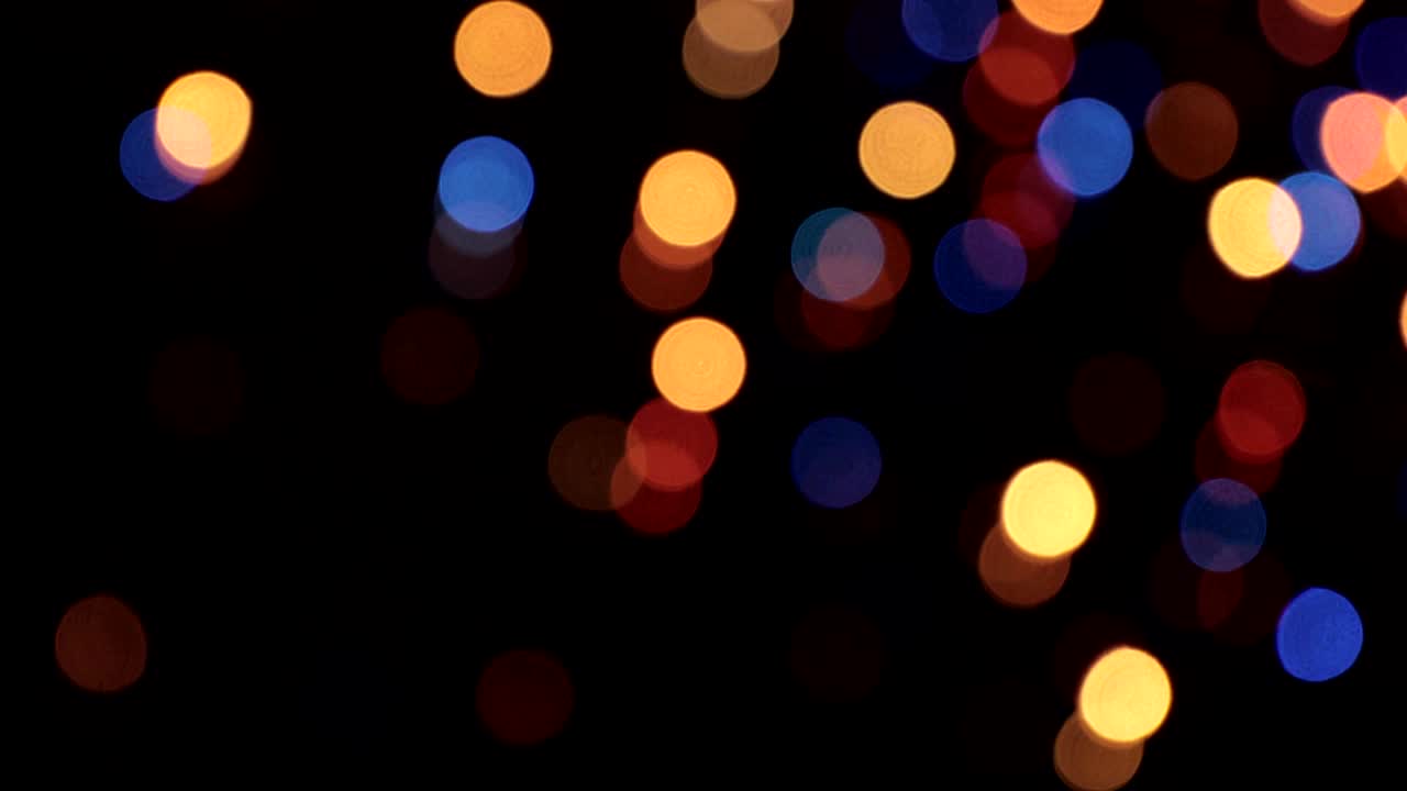 Sfondo bokeh. Sfondo sfocato astratto multicolore con ghirlanda lampeggiante.