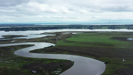 aerial winding river, internationally important wetlands and lake