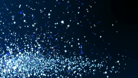 Blue glitter sparkles texture on dark background. Shiny abstract animation.