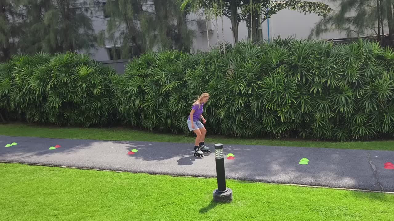 Woman rollerblading in a park