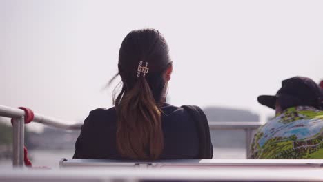 woman on a river boat