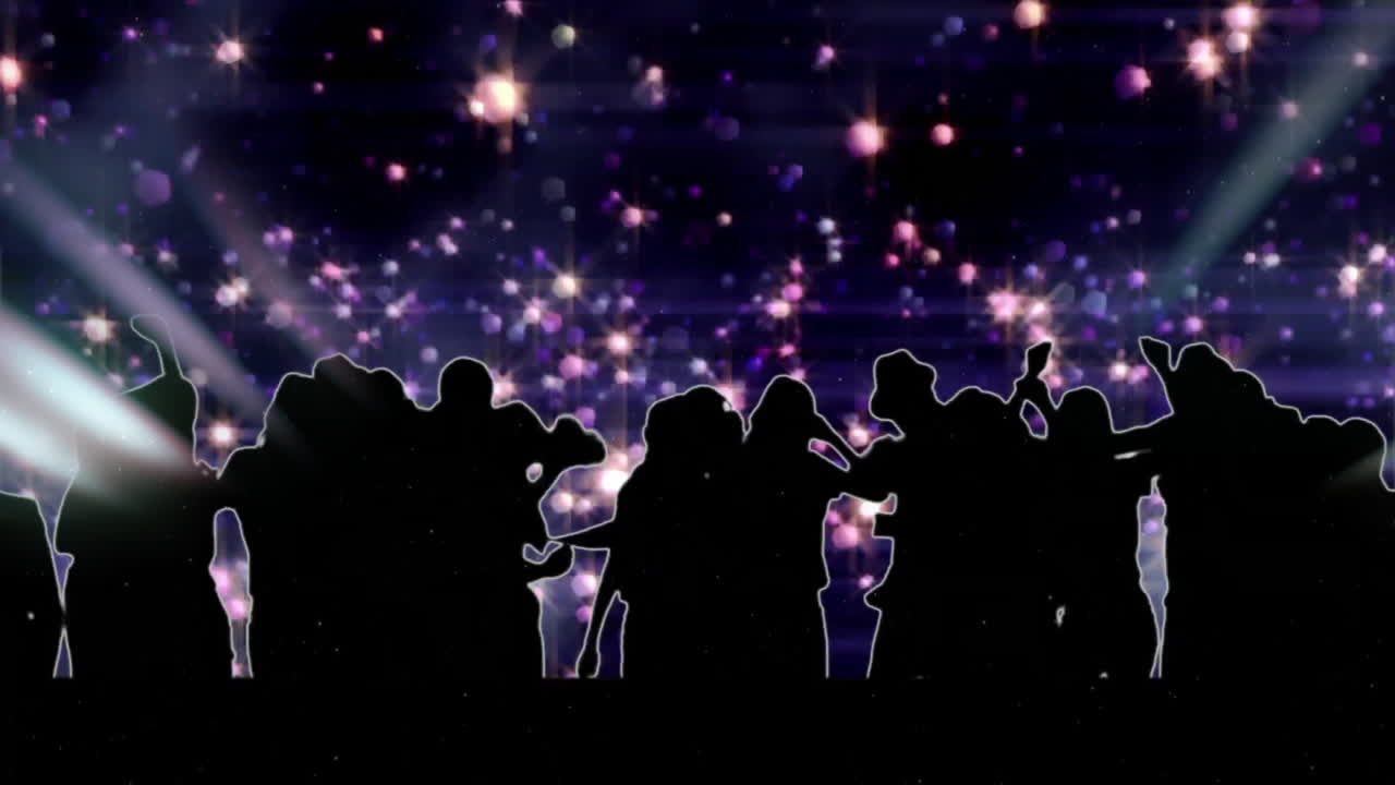 Under starry night sky, silhouetted crowd watching animation of sparkling stars