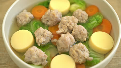 homemade cabbage clear soup with tofu and minced pork bowl