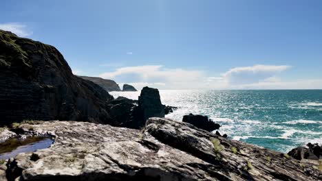 A-static-4K-shot-of-Three-Castle-Head-near-Dunlough-Castle-Car-Park-looking-East