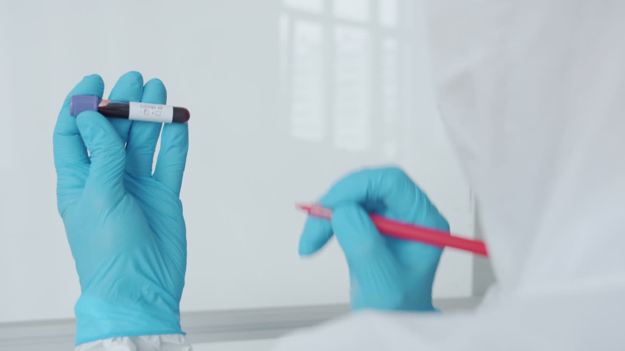 Lab Technician Performing a COVID-19 Test