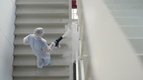 disinfecting a stairwell