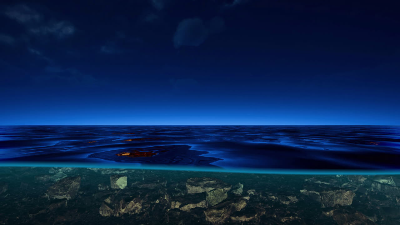 Serene ocean view with clear water and rocks beneath the surface at twilight