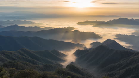 majestic sunrise over a sea of clouds in a mountain landscape