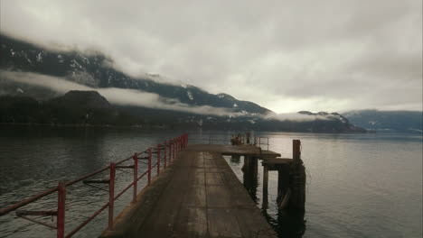 aerial view of boardwalk over calm ocean near mining area in squamish