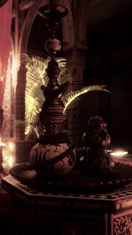 intricate hookah and decorative items in an oriental interior at night