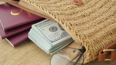 travel essentials in a straw bag