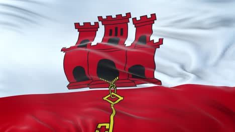 gibraltar flag waving in the wind with highly detailed fabric texture. seamless loop