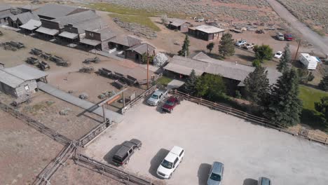 Slow-downward-aerial-pedestal-shot-of-the-Old-Trail-Town-western-scene-in-northern-Wyoming-during-the-summer