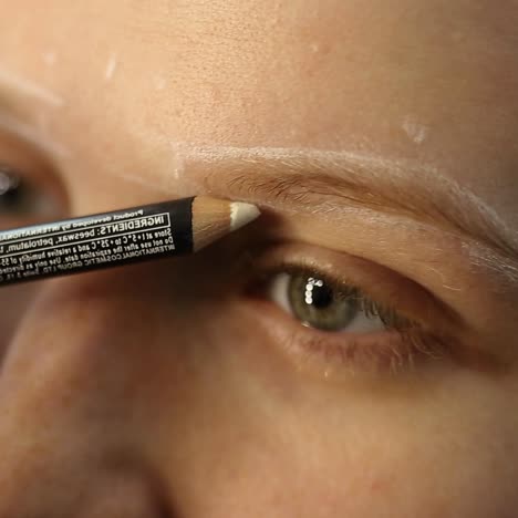cosmetologist preparing for permanent makeup