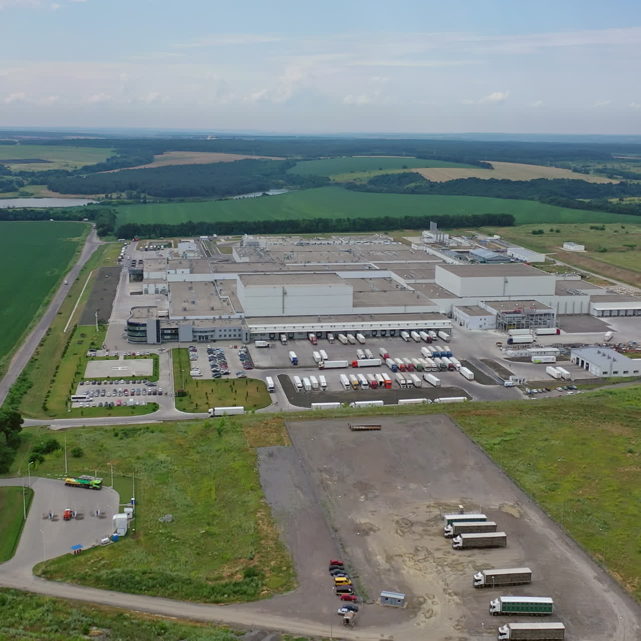 Aerial view of a modern poultry farm. Modern Factory Exterior