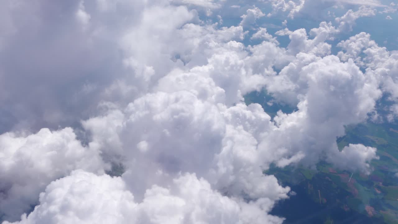 Flying by lots of Fluffy Cumulus Clouds