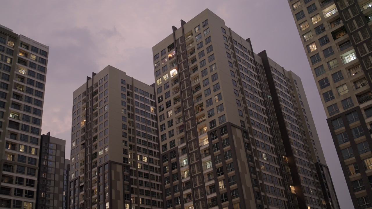 Low Angle Static View Apartment Buildings in Ho Chi Minh City at Dusk