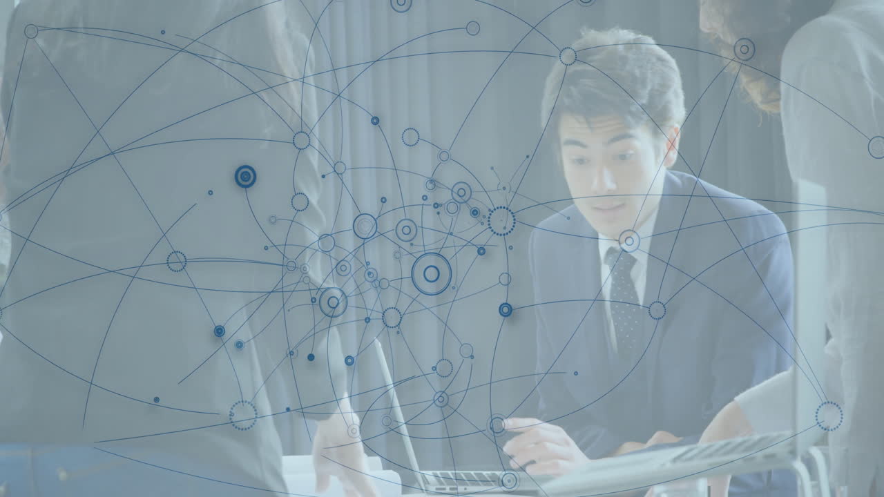 Collaborating business professionals with data animation overlay in office setting