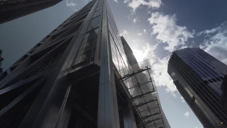 impressive view from the ground of london skyscrapers in the business area