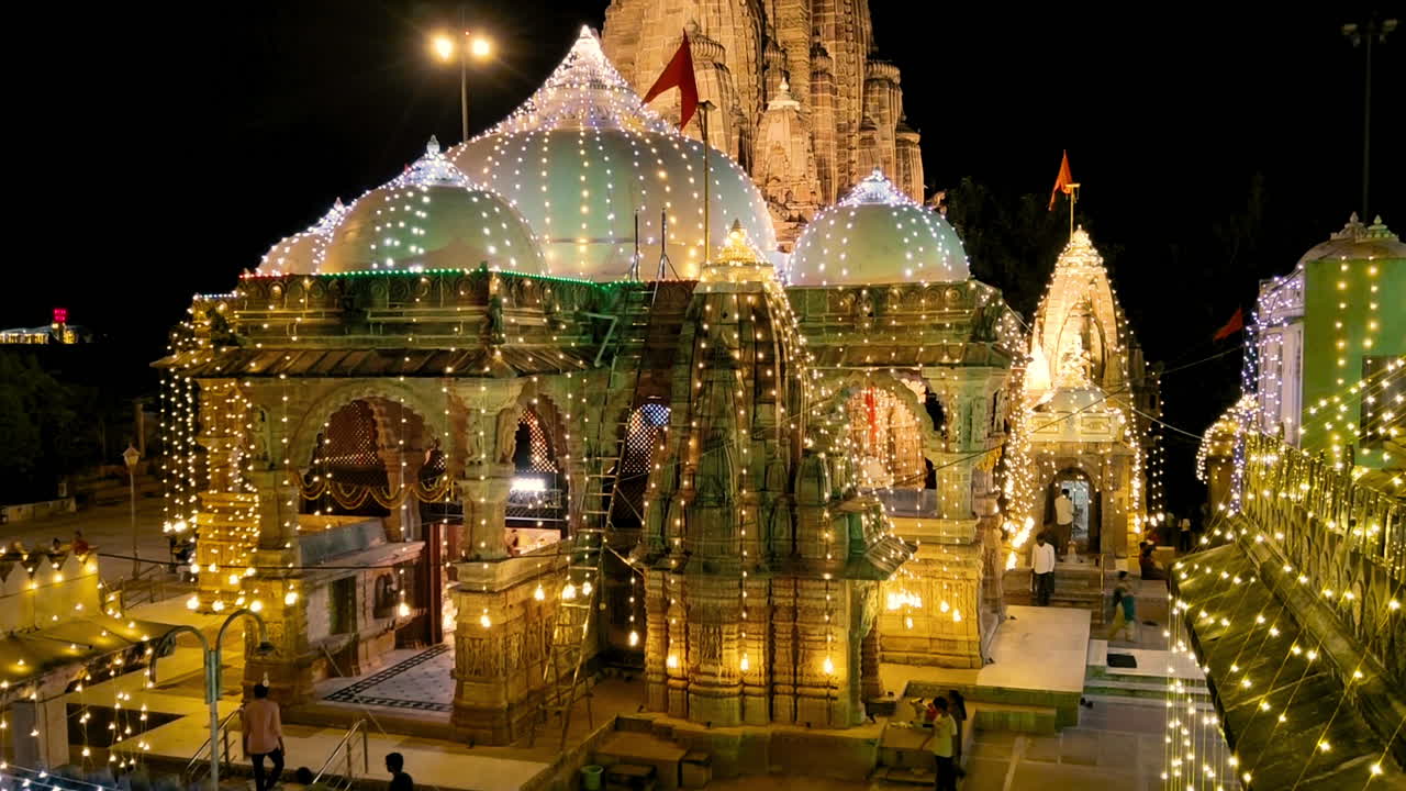Hatkeshwar Mahadev Temple in Vadnagar Gujarat India glows with decorative lights at night, showcasing heritage Hindu architecture and festive ambiance in a spiritual setting