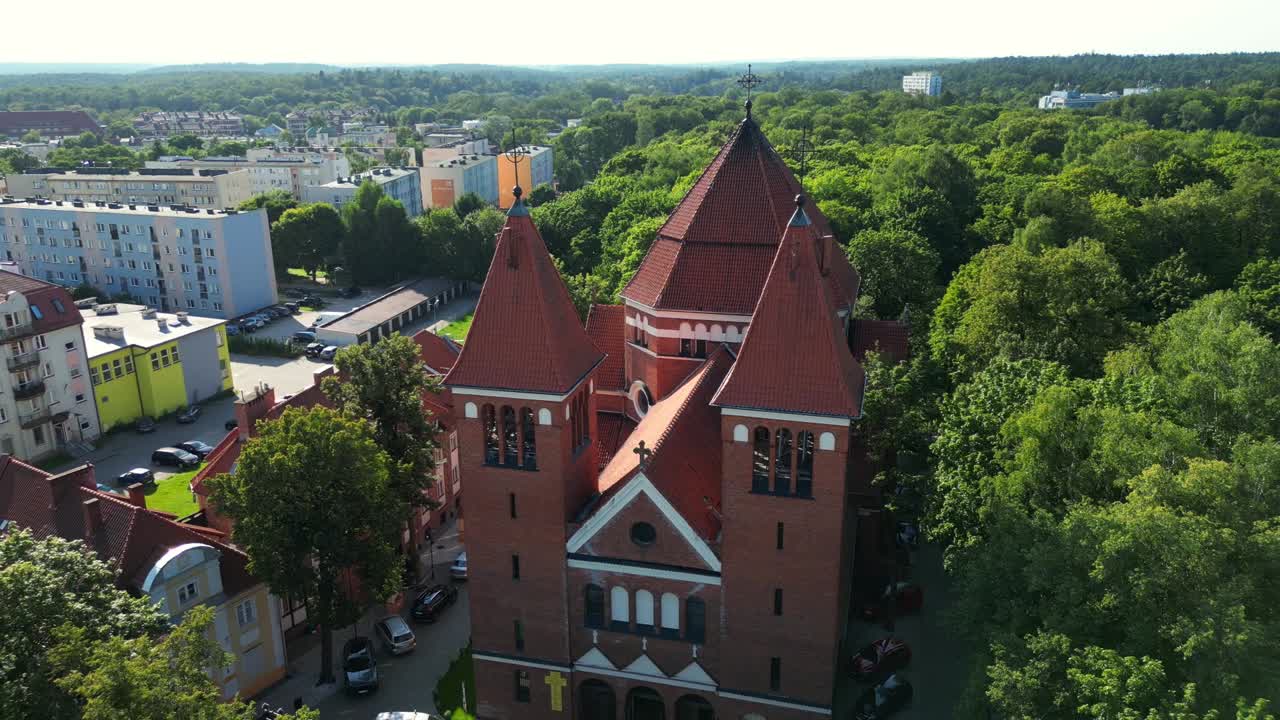 Drone View of Historic Gothic Church and Tower in Sunlight