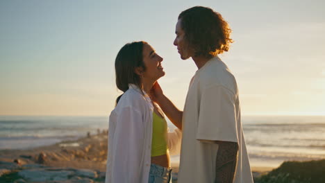 couple enjoying a romantic sunset at the beach