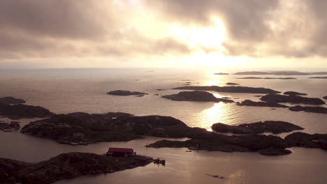 Slow-aerial-pull-in-towards-the-horizon-at-sunset-in-the-Swedish-archipelago