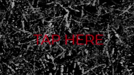 animation of red neon text, tap here, on monochrome grass background