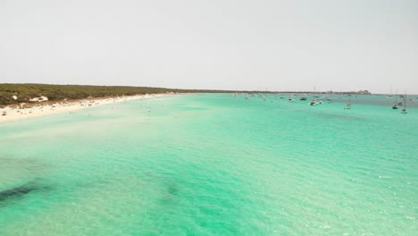 Spain,-Mallorca-Platja-des-Trenc-beach-a-beautiful-fly-by-over-the-beach-at-4k-24-fps-with-ND-filters-on-a-very-bright-day-with-a-DJI-Mavic-Air-drone