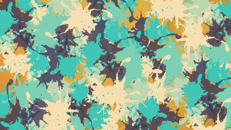 animación de múltiples manchas coloridas sobre un fondo naranja