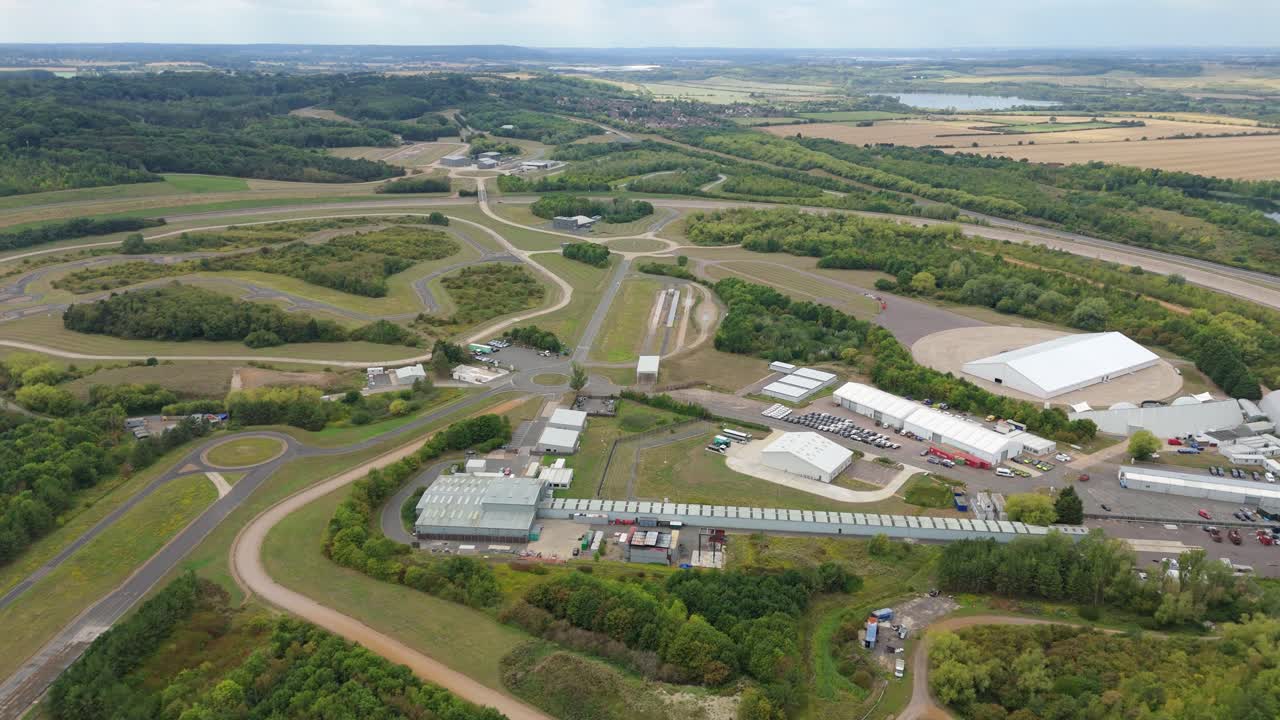 Aerial panorama of Bedford UK proving grounds automotive testing track showing vehicle research, car innovation and countryside rural green environment