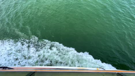 top view from boat to stream of water in the sea