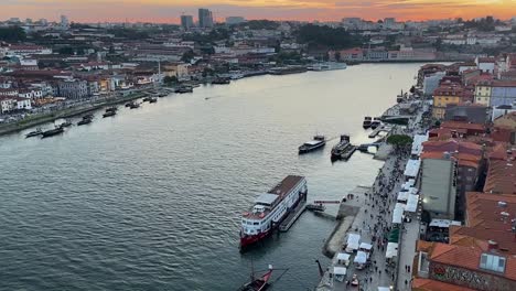 overview of porto beautiful cityscape on river coast at sunset time, portugal