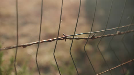 barbed wire metal fence to create barrier