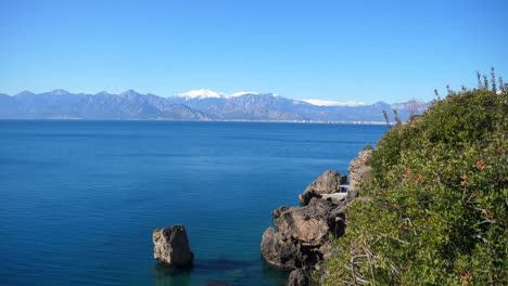 Tripod-shot-of-the-Mediterranean-Sea,-mountains-and-landscape-outside-of-Antalya,-Turkey