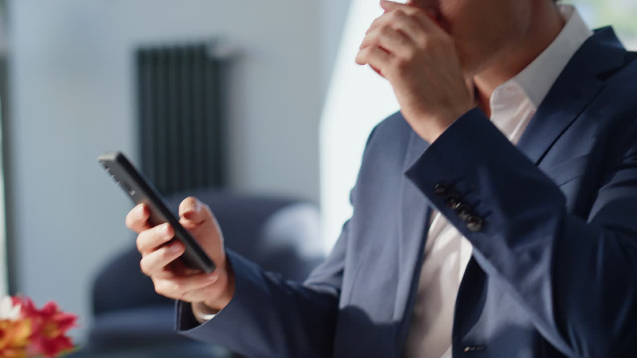 Bearded boss messaging smartphone panoramic restaurant closeup. Business people