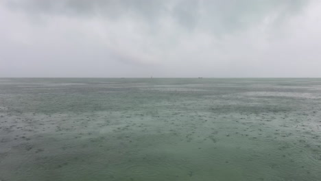 rain falling on the ocean