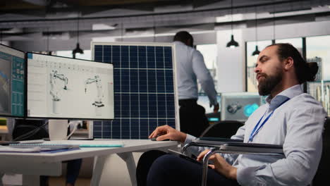 rd researcher with disability in wheelchair studying solar alternative energy