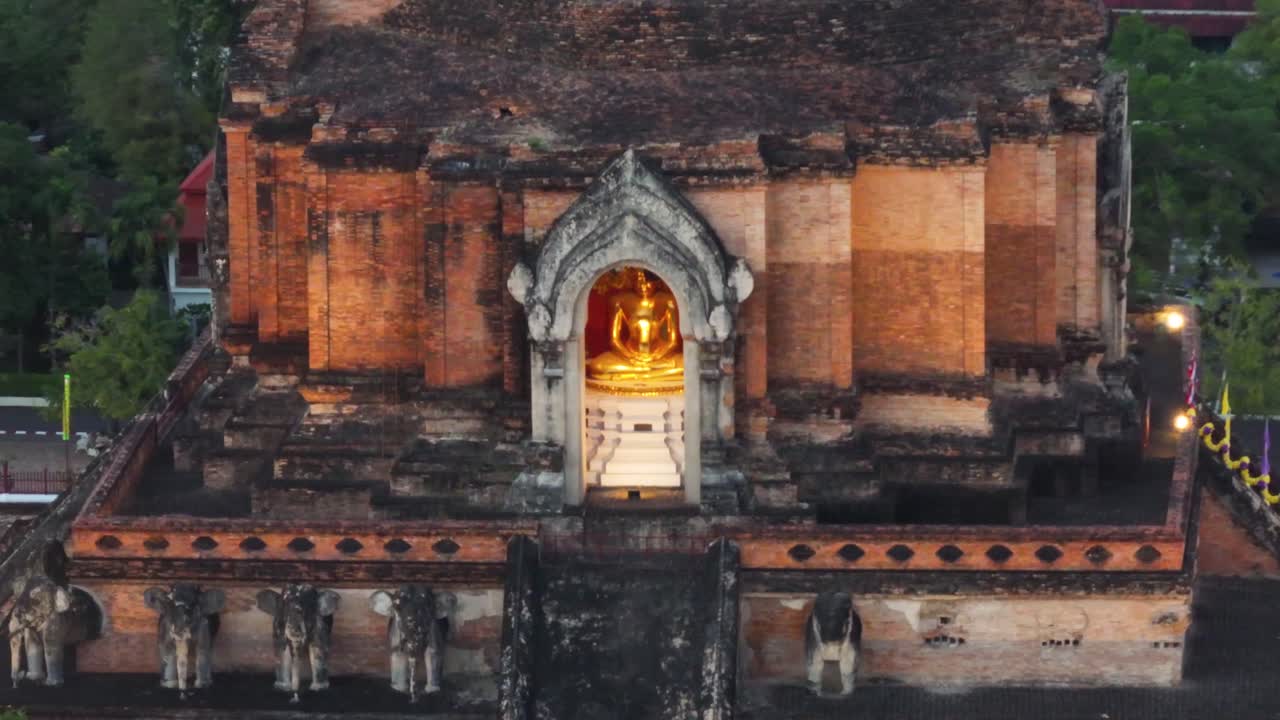 Golden Buddha statue in old Wat Chedi Luang Temple in Chian Mai city, Thailand. History