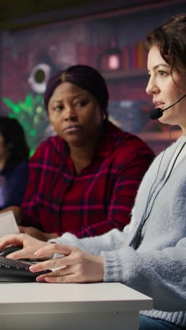 vertical video call center team leader going over paperwork files