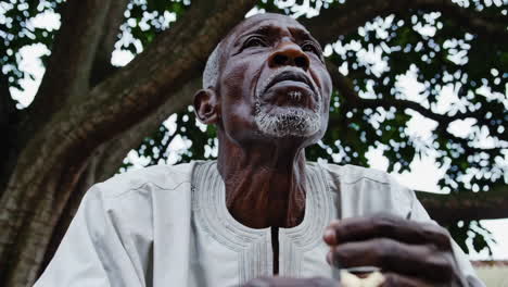 elderly african man in traditional attire