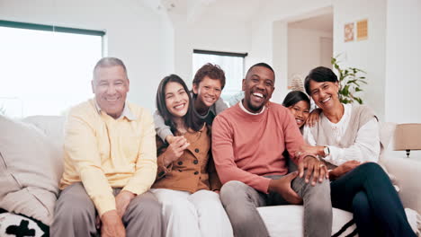 smile, face and big family on a sofa at their home