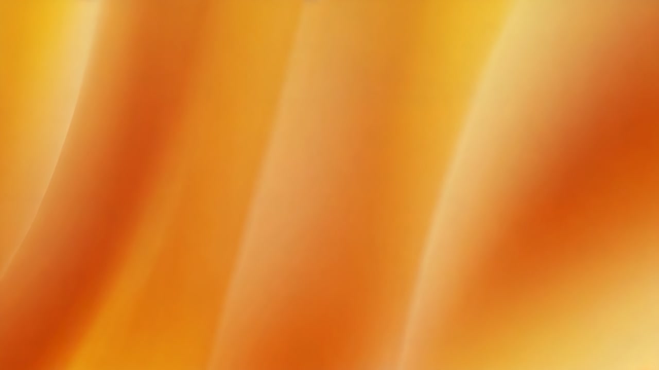 Slow pan causing sliding curved band revealing deeper orange ribbon in studio, glossy texture