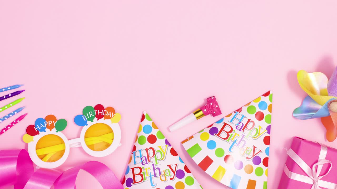 Party decorations and accessories appear on bottom of pastel pink theme. Stop motion