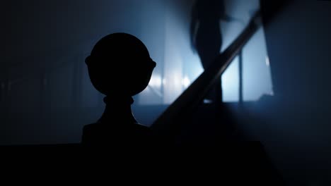 a mysterious and beautiful woman in an evening dress and high heels climbs the stairs into the smoky room