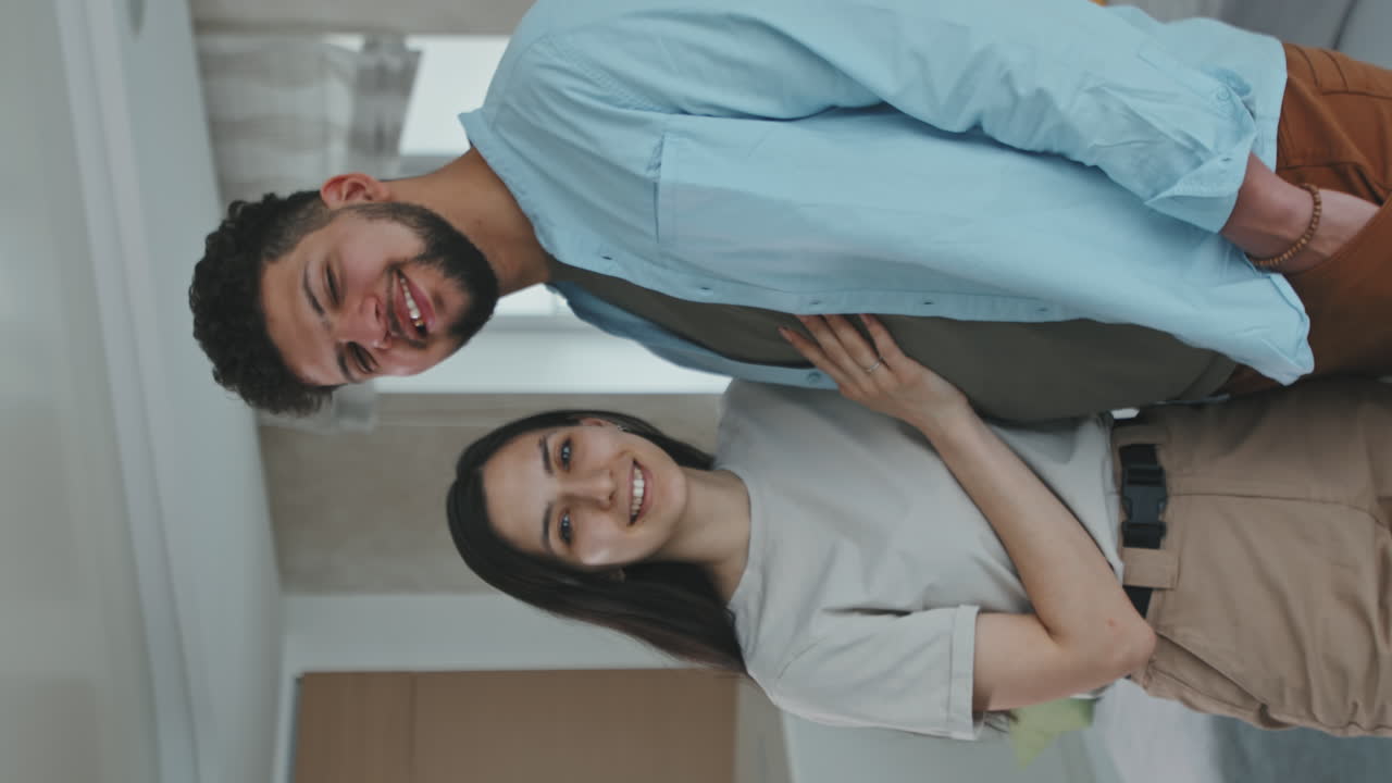 Portrait Of Beautiful Latin Couple At Home