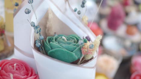 close-up of beautiful rose-shaped decorative candles
