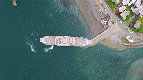 Aerial-Birds-Eye-View-Of-Ferry-Boat-Docked-At-Ramp-In-Hornopiren-Town-Located-In-Commune-Of-Hualaihué-in-Palena-Province,-Southern-Chile